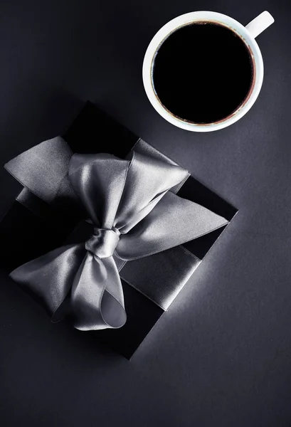 Luxury coffee brand, cup and gift box on black flatlay backgroun