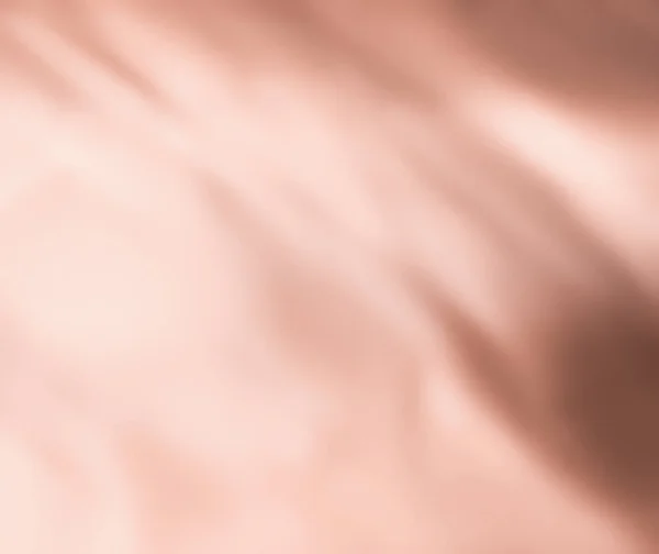 ベージュの抽象的なアートの背景、シルクの質感と波線 — ストック写真