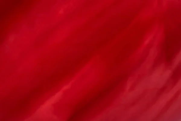 Red abstract art background, silk texture and wave lines in moti — Stock Photo, Image