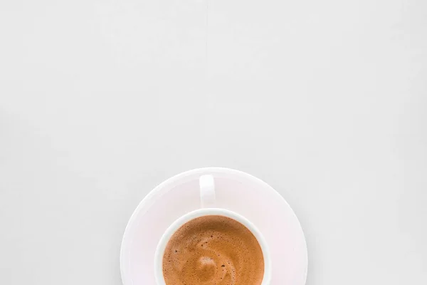 Cup of hot french coffee as breakfast drink, flatlay cups on whi