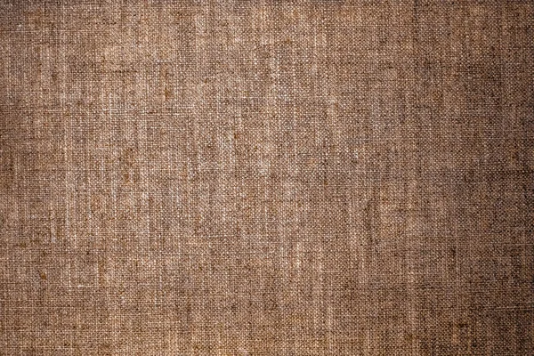 Decorative brown linen fabric textured background for interior,