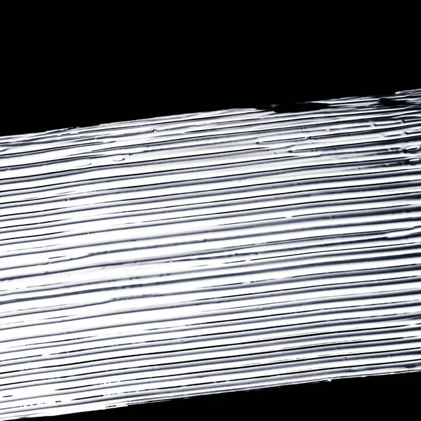 Srebrny Pędzel do malowania pędzlem w kolorze białym na czarnym tle, — Zdjęcie stockowe