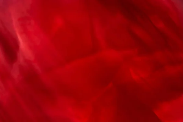 Red abstract art background, silk texture and wave lines in moti — Stock Photo, Image