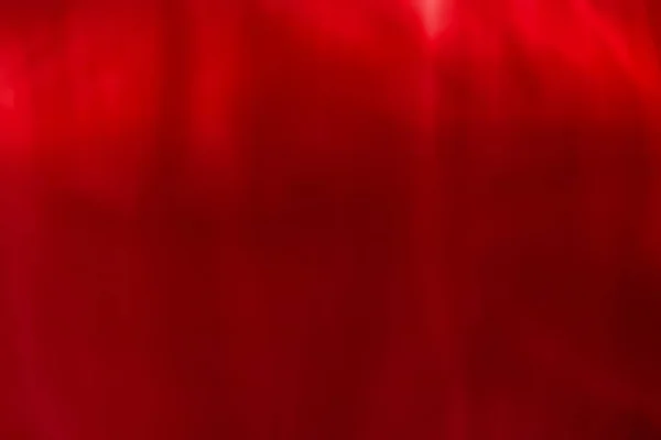 Röd abstrakt konst bakgrund, silkes textur och våglinjer i moti — Stockfoto