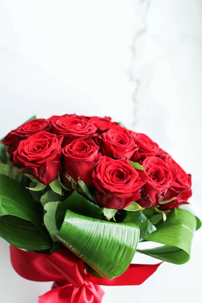 stock image Holiday love present on Valentines Day, luxury bouquet of red ro