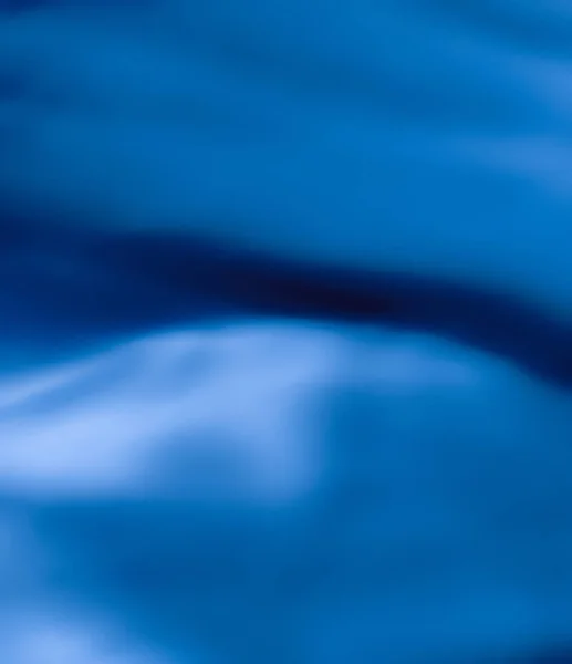 Fundo de arte abstrata azul, textura de seda e linhas de onda em mot — Fotografia de Stock