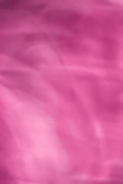 Рожевий абстрактний художній фон, шовкова текстура та хвильові лінії в моторі — стокове фото