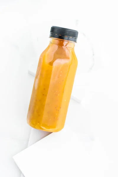 stock image Detox fruit smoothie juice in a bottle, diet catering delivery. 