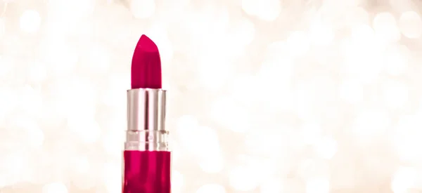 Kastanienbrauner Lippenstift auf goldenen Weihnachten, Neujahr und Valentinstag — Stockfoto