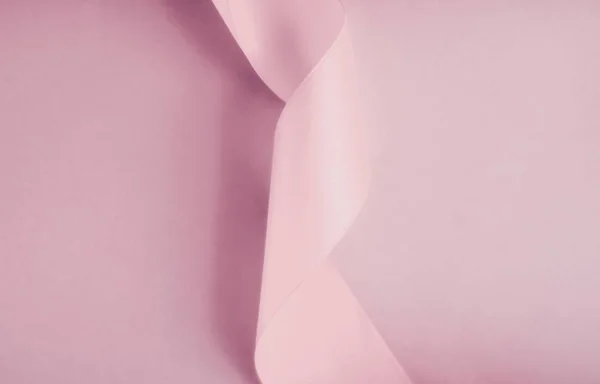 Nastro astratto di seta su sfondo rosa arrossito, lusso esclusivo — Foto Stock