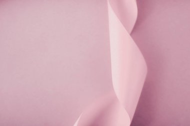 Pembe arka planda soyut ipek kurdele, özel lüks. 