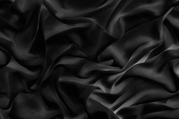 Luxe zwarte zachte zijde flatlay achtergrond textuur, vakantie glamo — Stockfoto
