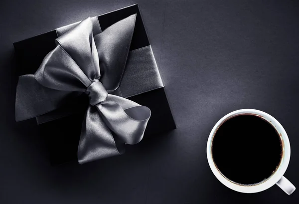 Luxury coffee brand, cup and gift box on black flatlay backgroun