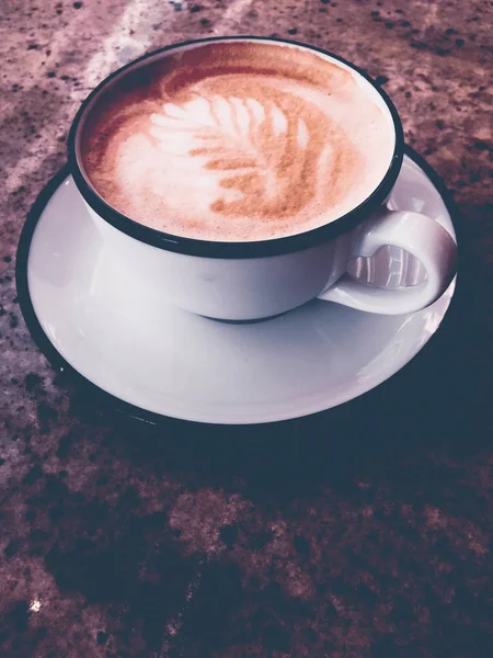 Cappuccino for breakfast in cafeteria, coffee cup on table in pa — Stock Photo, Image