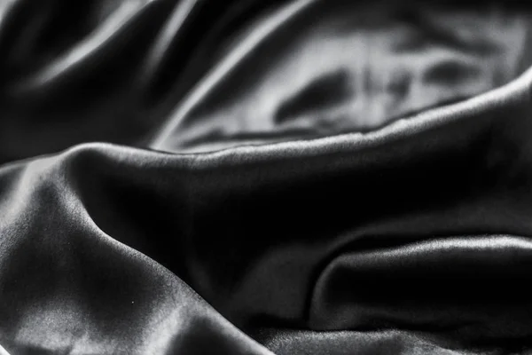 Luxus fekete puha selyem flatlay háttér textúra, ünnep glamo — Stock Fotó