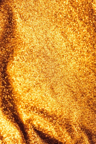 Золотой праздничный блеск на фоне роскошных ши — стоковое фото
