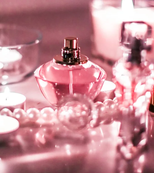 Perfume bottle and vintage fragrance on glamour vanity table at — Stock Photo, Image
