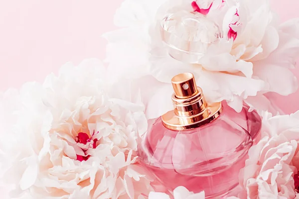 Luxe fragrance bottle as girly perfume product on background of peony flowers, parfum ad and beauty branding — Stock Photo, Image