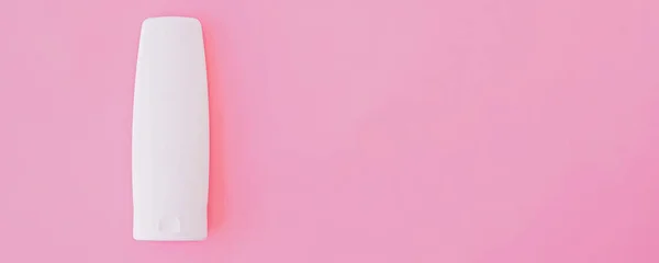 Crema hidratante para manos o loción corporal sobre fondo rosa, productos de belleza y cosméticos para el cuidado de la piel — Foto de Stock