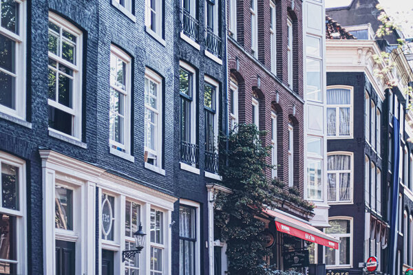Main downtown street in the city center of Amsterdam in Netherlands