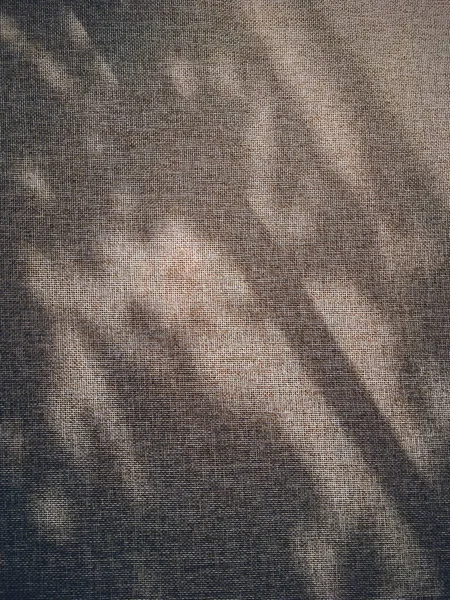 Linen texture and shadows as rustic background — Stock Photo, Image