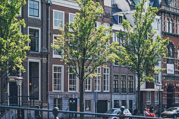 Main downtown street in the city center of Amsterdam in Netherlands