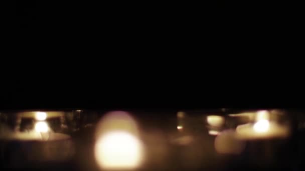 Candle light at night as holiday background and luxury bokeh, abstract motion and sparkling highlights — Stock Video