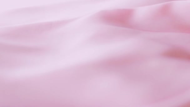 Textura de tela de seda rosa de cerca como fondo de marca de moda, superficie textil y material liso de lujo — Vídeo de stock