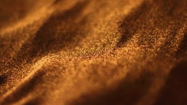 Goldene glänzende Textur in Nahaufnahme für Modemarke als Urlaubsglitzerhintergrund, textile Oberfläche und Luxusmaterial — Stockvideo