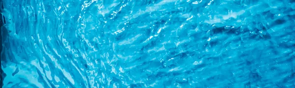 Blauwe water textuur als abstracte achtergrond, zwembad en golven ontwerp — Stockfoto