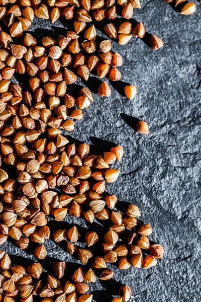 Buckwheat grain closeup, food texture and cook book background — Stock Photo, Image