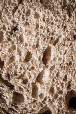 Taze tahıllı ekmek, organik buğday unu, yemek blogu veya yemek kitabı tarifi için arka plan olarak dilimleme dokusu