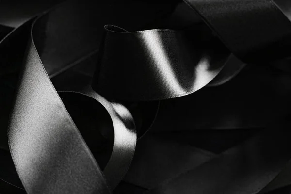 Black and white silk ribbon as background, abstract and luxury brand design