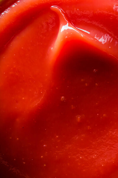 Organic ketchup, tomato sauce closeup, food background and homemade recipe