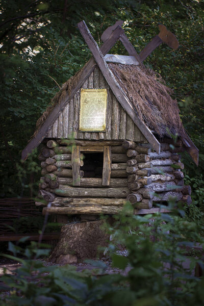 Fairy-tale hut in the dark forest