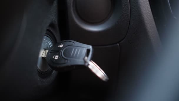 Close-up. Female hand turns off the car. Keys, ignition 4K Slow Mo — Stock Video