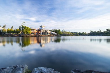 Springfield Lakes, Ipswich City, Australia - Wednesday 1st August, 2018: View of the lake and local business in Springfield Lakes during the day on Wednesday 1st August 2018. clipart