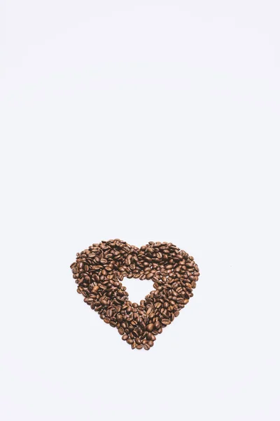 Grãos de café espalhados — Fotografia de Stock