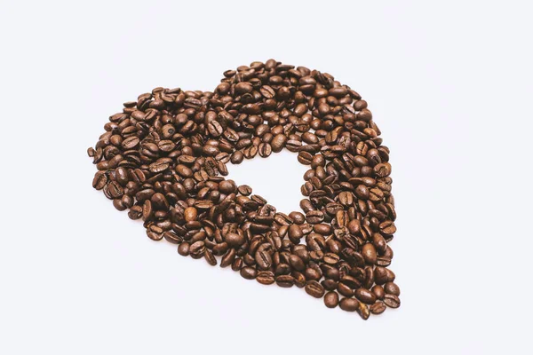 Spridda kaffebönor — Stockfoto