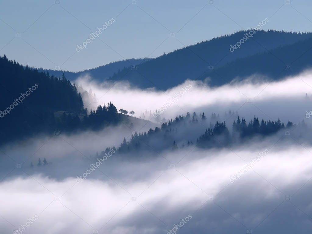 A high density of fog surrounding the mountains to flow. 