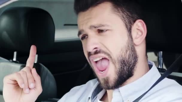 Close Handsome Man Gesturing Singing While Sitting Car — Stock Video