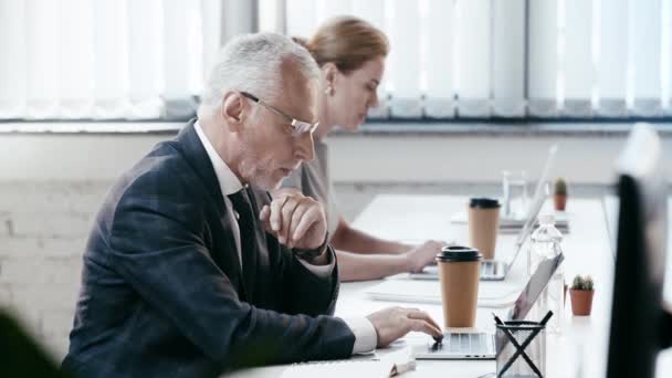 Selective Focus Bearded Businessman Using Laptop Typing Taking Paper Cup — Stock Video