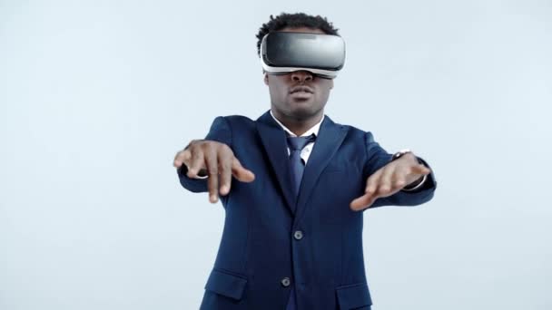 African American Businessman Using Headset Gesturing Isolated Grey — Stock Video