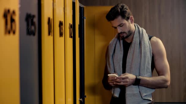Handsome Man Using Smartphone Locker Room — Stock Video