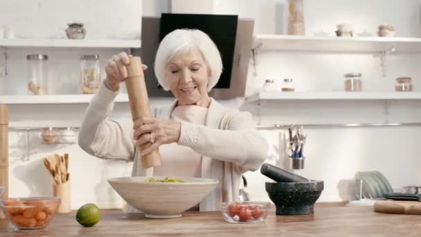Smiling Woman Seasoning Salad Salt — Stock Video