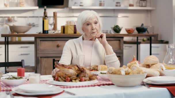 Woman Sitting Table Obscuring Face — Stock Video