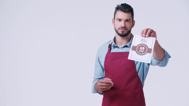 Handsome Waiter Apron Showing Menu Isolated White — Stock Video