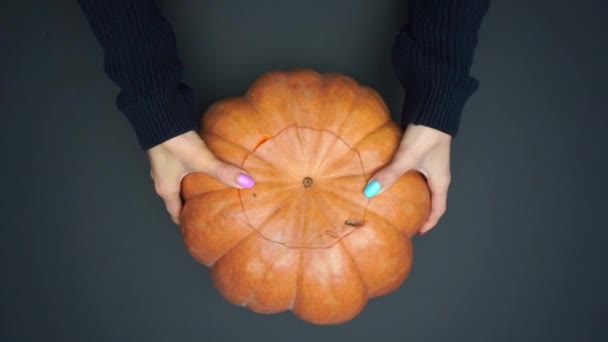 Top View Woman Replacing Carved Pumpkin Black Halloween Concept — стоковое видео