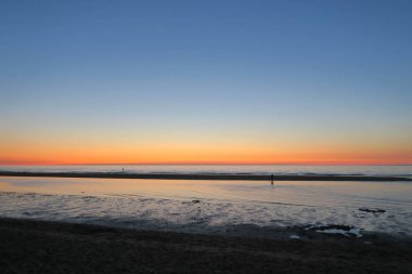 Hollanda, düşük tide Beach'te akşam