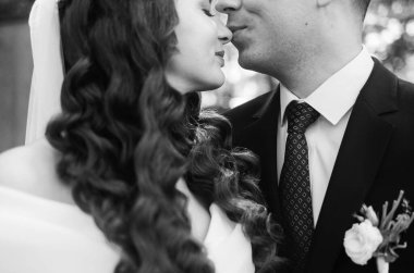 Wedding, love and bride with groom in garden for marriage, ceremony celebration and commitment. Romantic partners, trust and bridal couple hug, embrace and happy for romance, calm and peace in park.